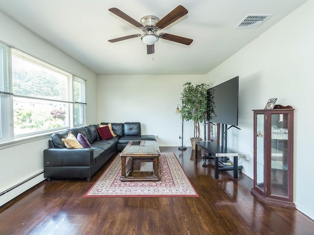 14 Marwood Rd S, Port Washington, NY 11050 - living area featuring wood finished floors, baseboard heating, a ceiling fan, and baseboards