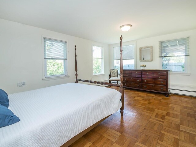 14 Marwood Rd S, Port Washington, NY 11050 - bedroom featuring a baseboard radiator