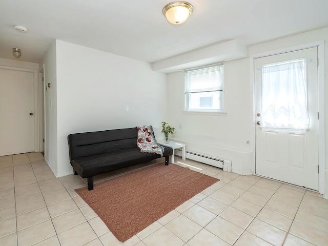 14 Marwood Rd S, Port Washington, NY 11050 - foyer with a baseboard heating unit and light tile patterned flooring