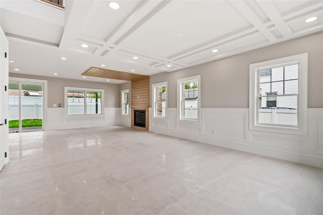 78 Shafter Ave, Albertson, NY 11507 - unfurnished living room with coffered ceiling, a wainscoted wall, recessed lighting, and a fireplace