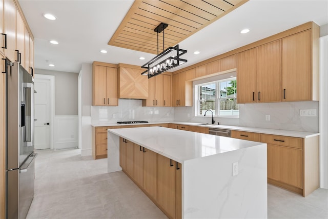 78 Shafter Ave, Albertson, NY 11507 - kitchen featuring appliances with stainless steel finishes, a kitchen island, recessed lighting, decorative backsplash, and a sink