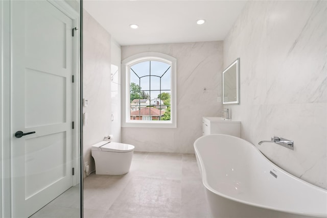 78 Shafter Ave, Albertson, NY 11507 - full bath with a freestanding tub, vanity, recessed lighting, and tile patterned floors