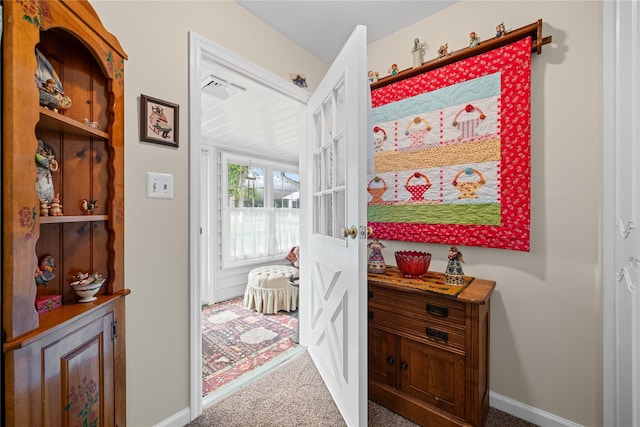 28 Trent Ct Unit B, Ridge, NY 11961 - hall featuring carpet floors and baseboards