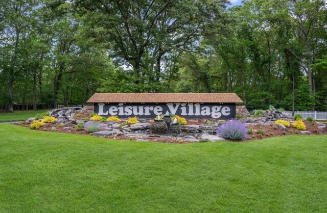 28 Trent Ct Unit B, Ridge, NY 11961 - community sign featuring a yard