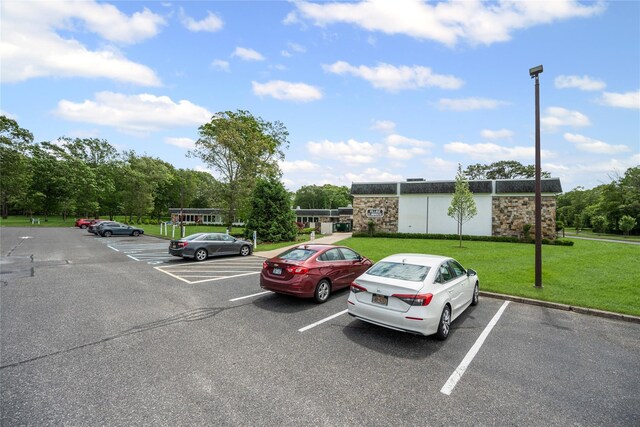 28 Trent Ct Unit B, Ridge, NY 11961 - view of uncovered parking lot