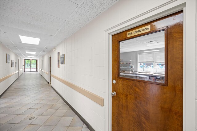 28 Trent Ct Unit B, Ridge, NY 11961 - hall featuring light tile patterned floors and a drop ceiling