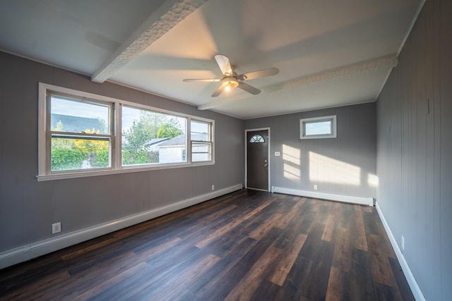 31 Peninsula Blvd, Valley Stream, NY 11581 - spare room featuring a baseboard radiator, dark wood-style floors, plenty of natural light, ceiling fan, and beamed ceiling