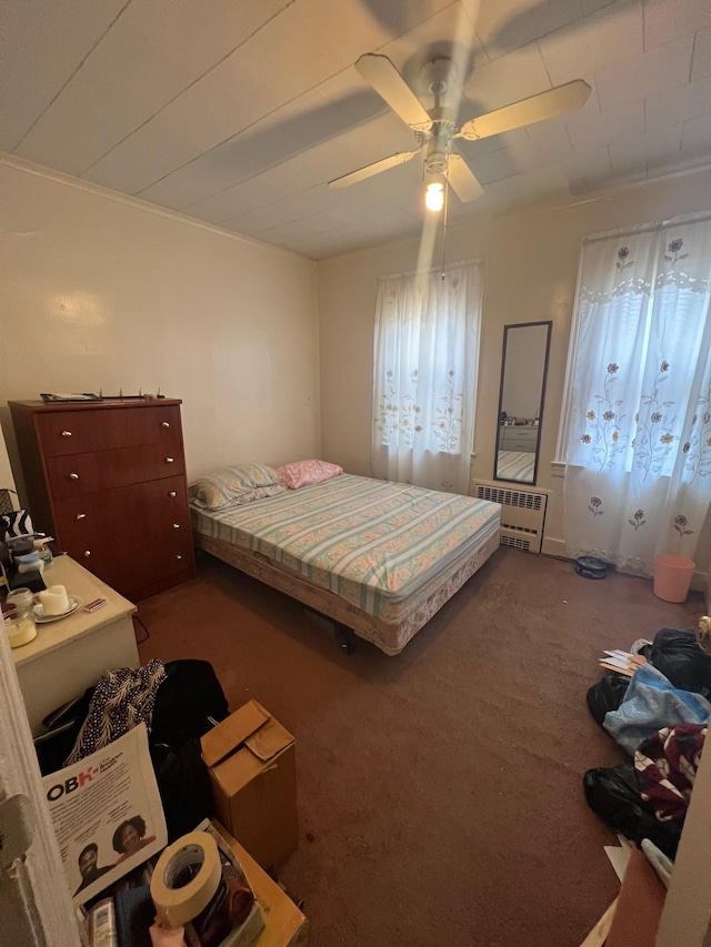 111-31 Lefferts Blvd, South Ozone Park, NY 11420 - bedroom with carpet flooring, ceiling fan, and radiator heating unit