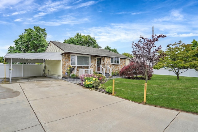 263 Claywood Dr, Brentwood, NY 11717 - ranch-style house featuring stone siding, concrete driveway, and a carport