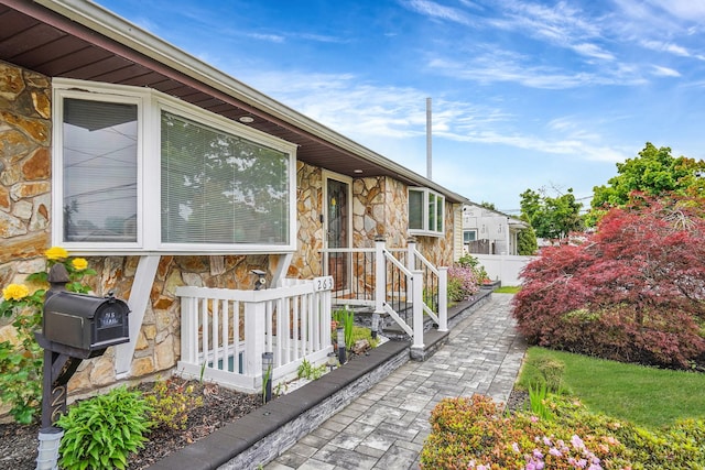 263 Claywood Dr, Brentwood, NY 11717 - entrance to property with stone siding