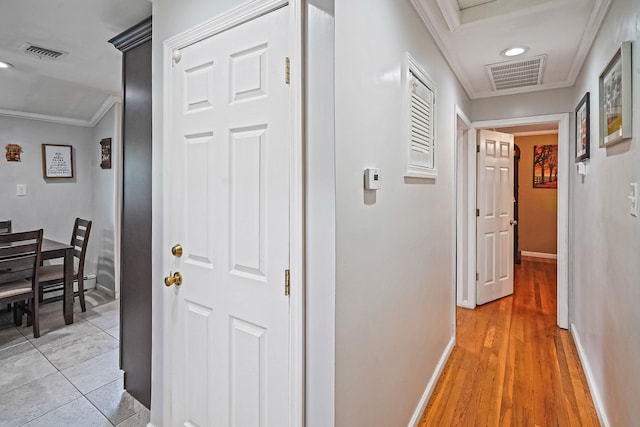 263 Claywood Dr, Brentwood, NY 11717 - hallway featuring crown molding, baseboards, light wood-style flooring, and recessed lighting