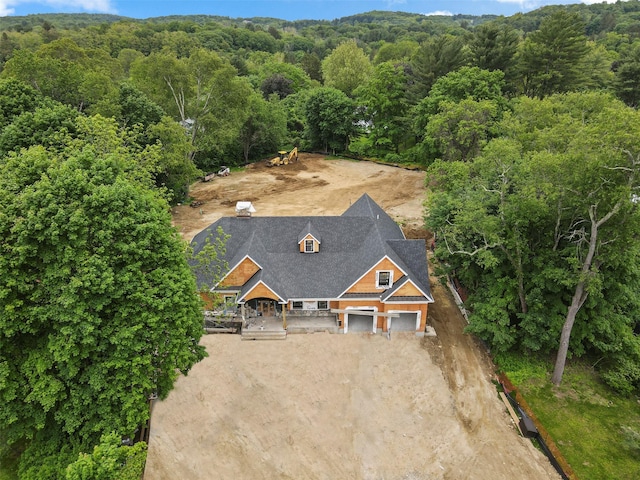 4 Circle Dr, Mount Kisco, NY 10549 - view of subject property featuring a heavily wooded area