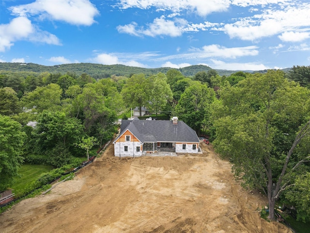 4 Circle Dr, Mount Kisco, NY 10549 - view of subject property featuring a heavily wooded area