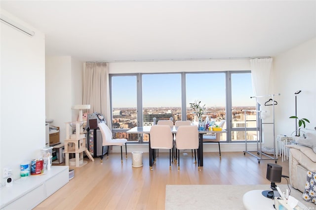 138-35 39th Ave Unit 16K, Flushing, NY 11354 - dining room featuring wood finished floors and healthy amount of natural light
