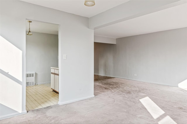 140-15 Holly Ave Unit 4E, Flushing, NY 11355 - unfurnished room featuring light carpet and baseboards