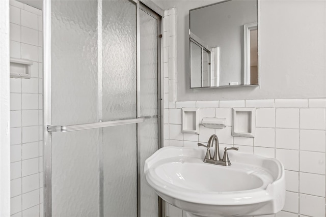 140-15 Holly Ave Unit 4E, Flushing, NY 11355 - full bath with a shower stall, a sink, and tile walls