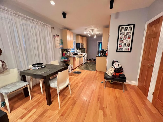 75-09 60th Pl, Glendale, NY 11385 - dining room featuring light wood-style flooring