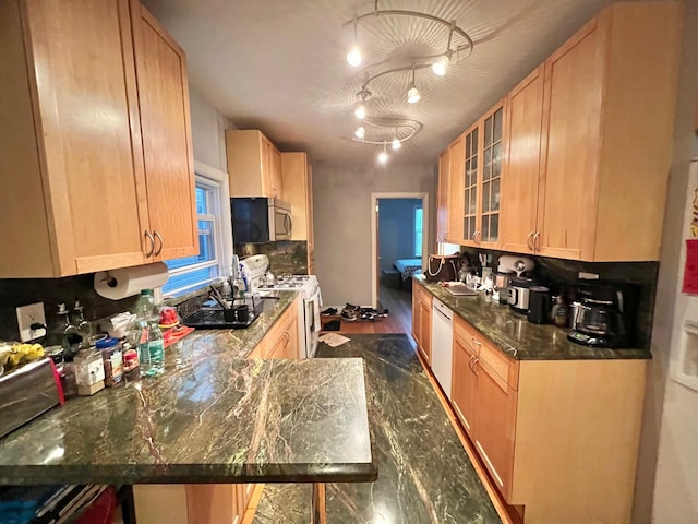 75-09 60th Pl, Glendale, NY 11385 - kitchen featuring white appliances, glass insert cabinets, a peninsula, and light brown cabinetry
