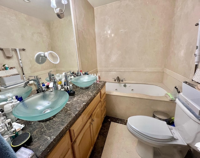 75-09 60th Pl, Glendale, NY 11385 - bathroom with a tub with jets, toilet, and double vanity