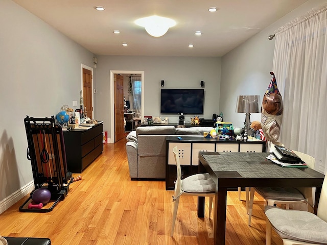 75-09 60th Pl, Glendale, NY 11385 - living room with light wood-type flooring and recessed lighting