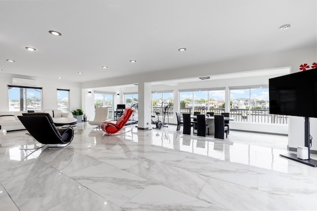 200LOTA Clocks Blvd, Massapequa, NY 11758 - living area with plenty of natural light, a wall mounted AC, recessed lighting, and marble tiled floors