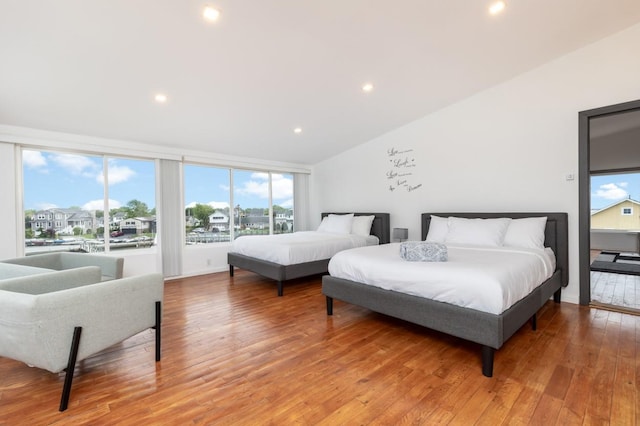 200LOTA Clocks Blvd, Massapequa, NY 11758 - bedroom featuring light wood-type flooring, multiple windows, lofted ceiling, and recessed lighting