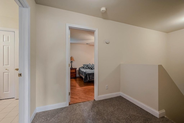 93 Mulberry Commons, Riverhead, NY 11901 - hallway with carpet flooring and baseboards
