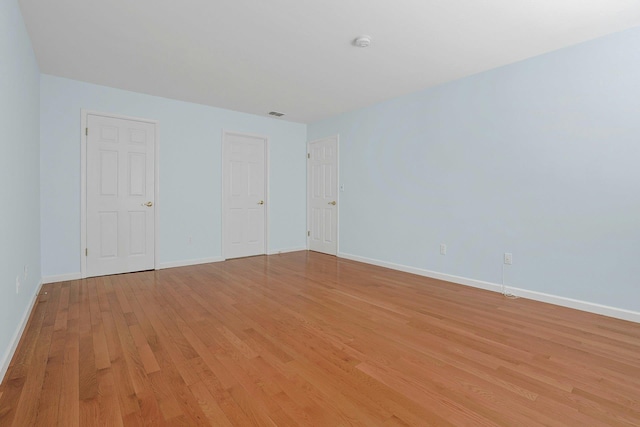 165 Carriage Ct Unit H, Yorktown Heights, NY 10598 - unfurnished bedroom with light wood-style flooring and baseboards