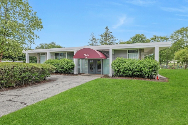 165 Carriage Ct Unit H, Yorktown Heights, NY 10598 - view of front of home with french doors and a front lawn