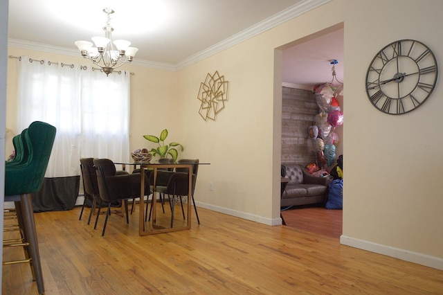 238 Adams St, Deer Park, NY 11729 - dining room featuring a chandelier, ornamental molding, and wood finished floors