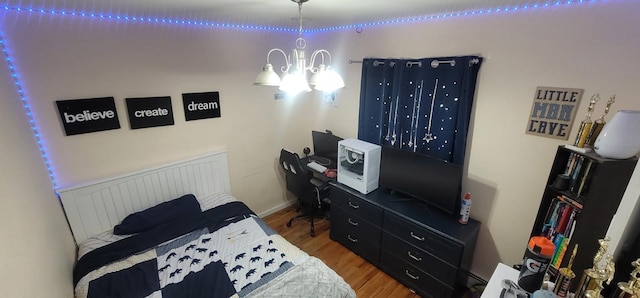 238 Adams St, Deer Park, NY 11729 - bedroom with wood finished floors, a chandelier, and a desk