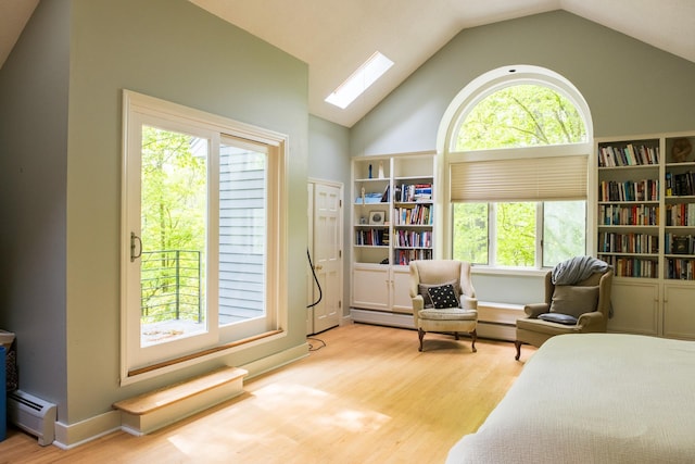 1900 Home, Sheffield, MA 01230 - bedroom featuring multiple windows, wood finished floors, high vaulted ceiling, baseboard heating, and a skylight