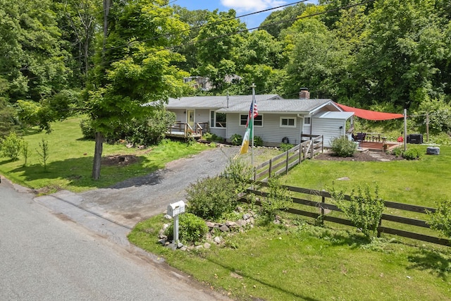 10 Hy Vue Ter, Cold Spring, NY 10516 - ranch-style house featuring a deck, driveway, and a chimney