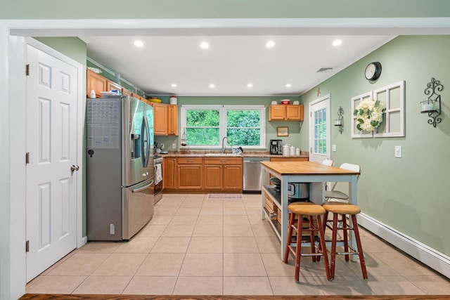 10 Hy Vue Ter, Cold Spring, NY 10516 - kitchen with stainless steel appliances, a sink, light tile patterned floors, light countertops, and recessed lighting