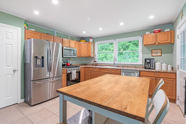10 Hy Vue Ter, Cold Spring, NY 10516 - kitchen with stainless steel appliances, a sink, light tile patterned floors, recessed lighting, and ornamental molding