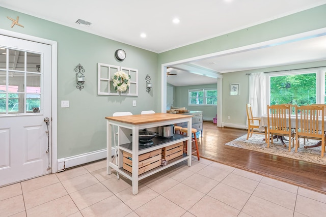10 Hy Vue Ter, Cold Spring, NY 10516 - dining area featuring light tile patterned flooring, baseboards, ornamental molding, a baseboard heating unit, and recessed lighting