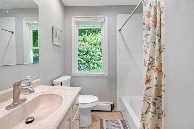 10 Hy Vue Ter, Cold Spring, NY 10516 - bathroom with baseboard heating, toilet, vanity, and healthy amount of natural light