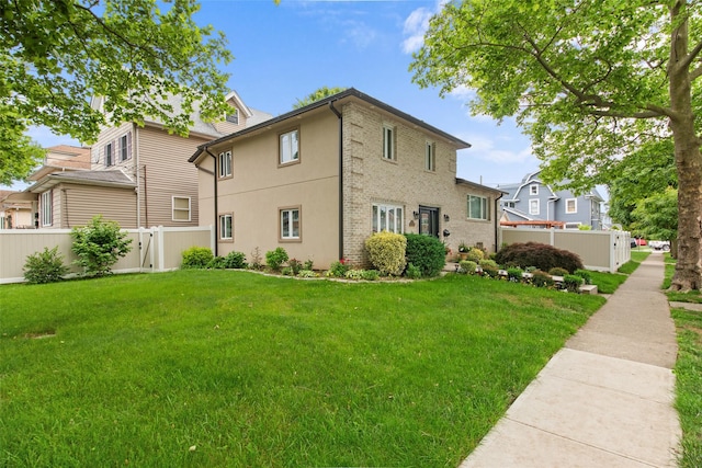 32 Henry Pl, Staten Island, NY 10305 - view of side of property featuring stucco siding and brick siding