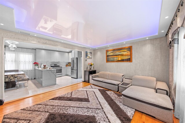 32 Henry Pl, Staten Island, NY 10305 - living room with light wood-style floors and recessed lighting