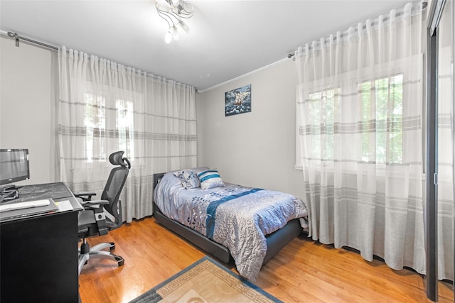 32 Henry Pl, Staten Island, NY 10305 - bedroom with wood finished floors and an office area