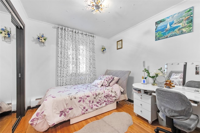 32 Henry Pl, Staten Island, NY 10305 - bedroom with ornamental molding, light wood-type flooring, a closet, and a baseboard radiator