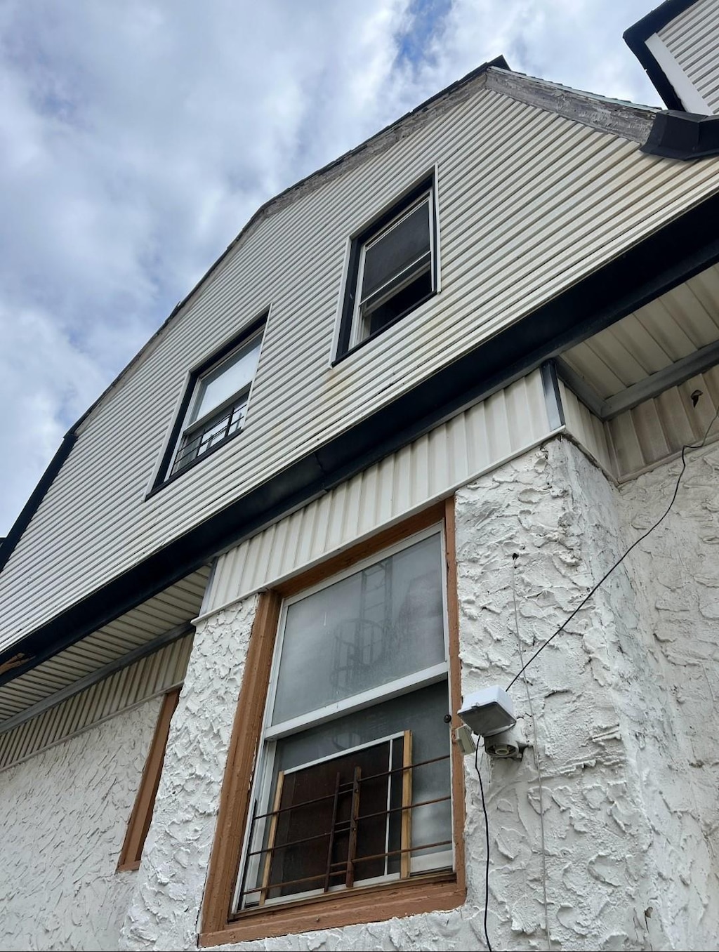 341 Bch 67th St, Far Rockaway, NY 11692 - view of home's exterior featuring stone siding
