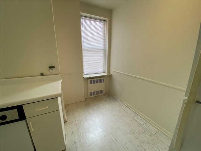 501 Riverdale Ave Unit 6L, Yonkers, NY 10705 - bathroom featuring radiator and baseboards