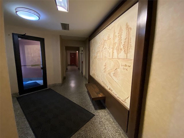 501 Riverdale Ave Unit 6L, Yonkers, NY 10705 - corridor with speckled floor and baseboards