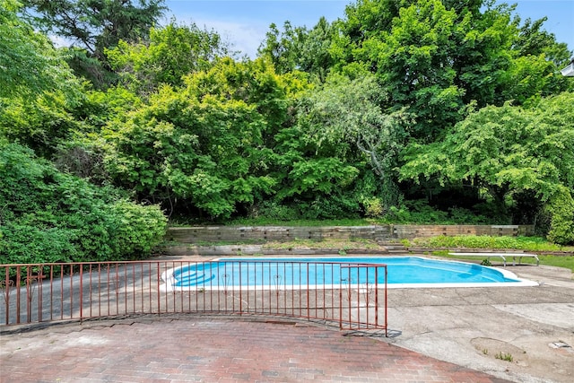 27 Meadowfield Ln, Glen Cove, NY 11542 - view of swimming pool featuring a diving board and a patio