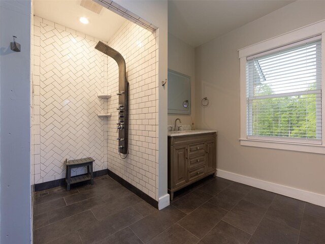 123 Wildwood Way, Forestburgh, NY 12777 - full bath featuring vanity, baseboards, a tile shower, and tile patterned flooring