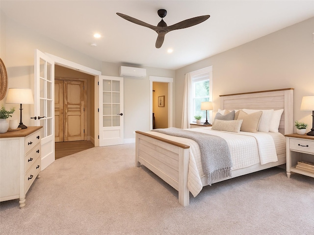 123 Wildwood Way, Forestburgh, NY 12777 - bedroom featuring a wall mounted AC, french doors, light carpet, ceiling fan, and recessed lighting