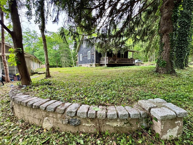210A Seven Bridges Rd, Mount Kisco, NY 10549 - view of green lawn with a deck