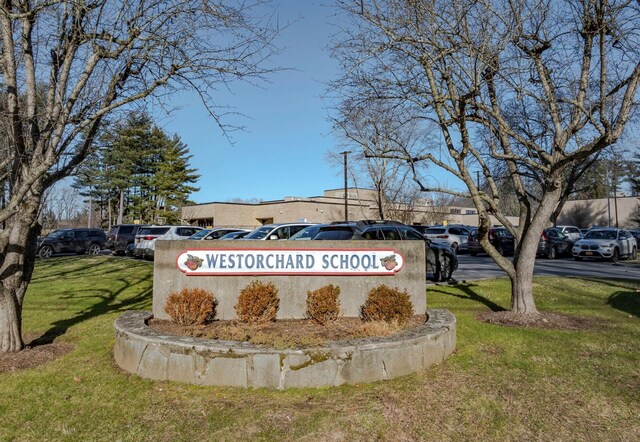 210A Seven Bridges Rd, Mount Kisco, NY 10549 - community / neighborhood sign with uncovered parking and a lawn