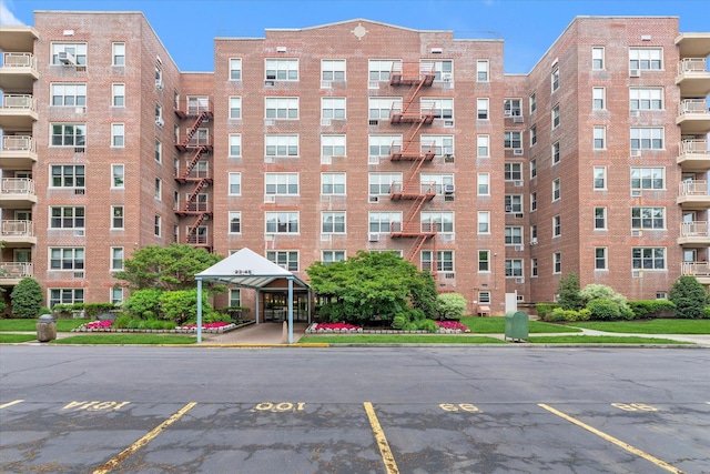 23-45 Bell Blvd Unit 4K, Bayside, NY 11360 - view of apartment building / complex featuring uncovered parking